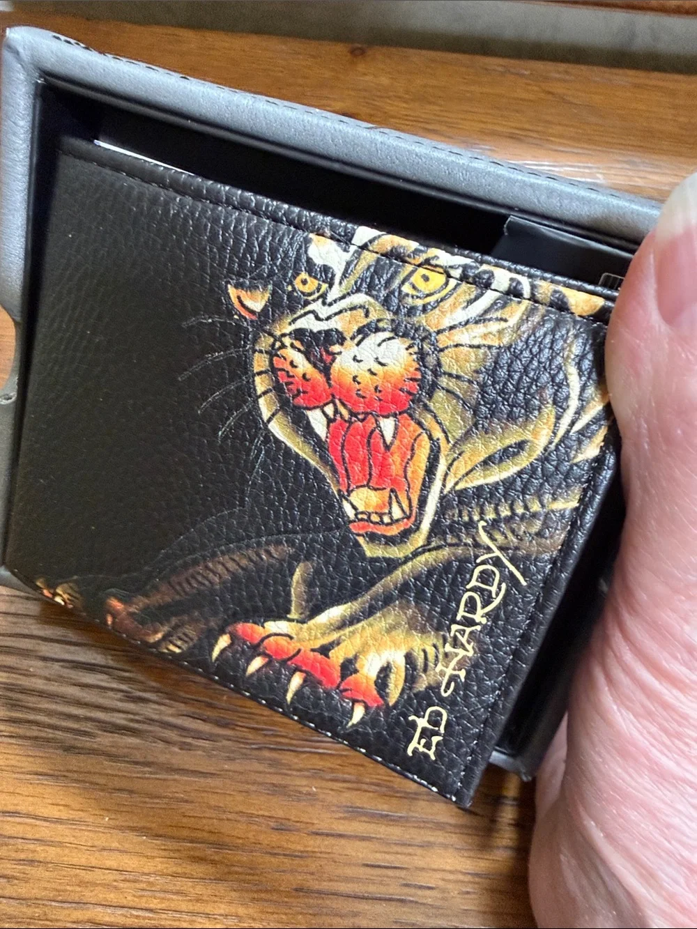 Ed Hardy Black Wallet with Fierce Tiger Artwork. Multiple card slots. ID window.